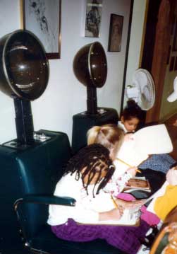 Anne (4 years), Marie (4.7 years), and Sherry  used the hair dryer chairs while making sketches of mirrors  