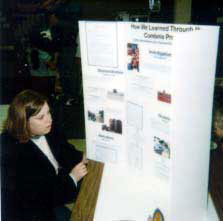 Figure 20. Kennedi's mom looking at a display.
