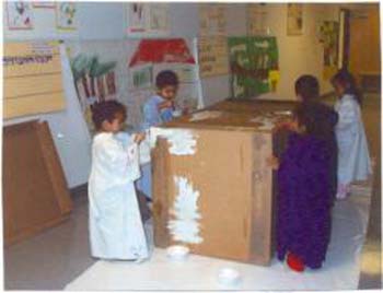 Figure 10. The children started painting the back of their truck.