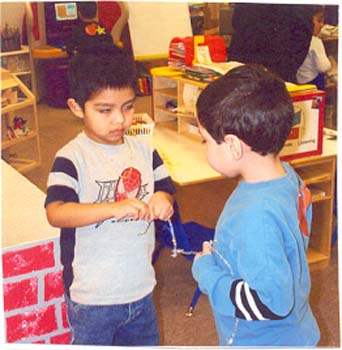 Figure 12b. Jose and Justin pulled on pipe cleaners.