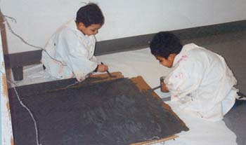 Figura 14. José y Felipe pintaron el montacargas. 
