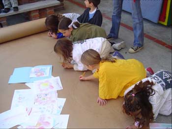 Figure 59. Drawings were transferred onto butcher paper to create the mural. 