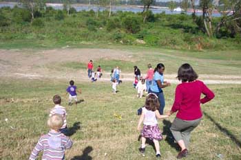 Figure 42. Children explore the Mississippi River levee bordering the LSU campus.