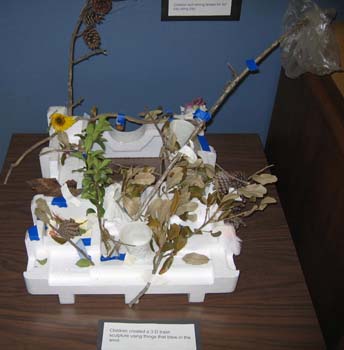 Figure 53. The children collected things that blow in the wind to create a trash sculpture.
