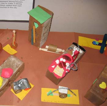 Figure 58. The children added a person, cars, and airplanes to the city.